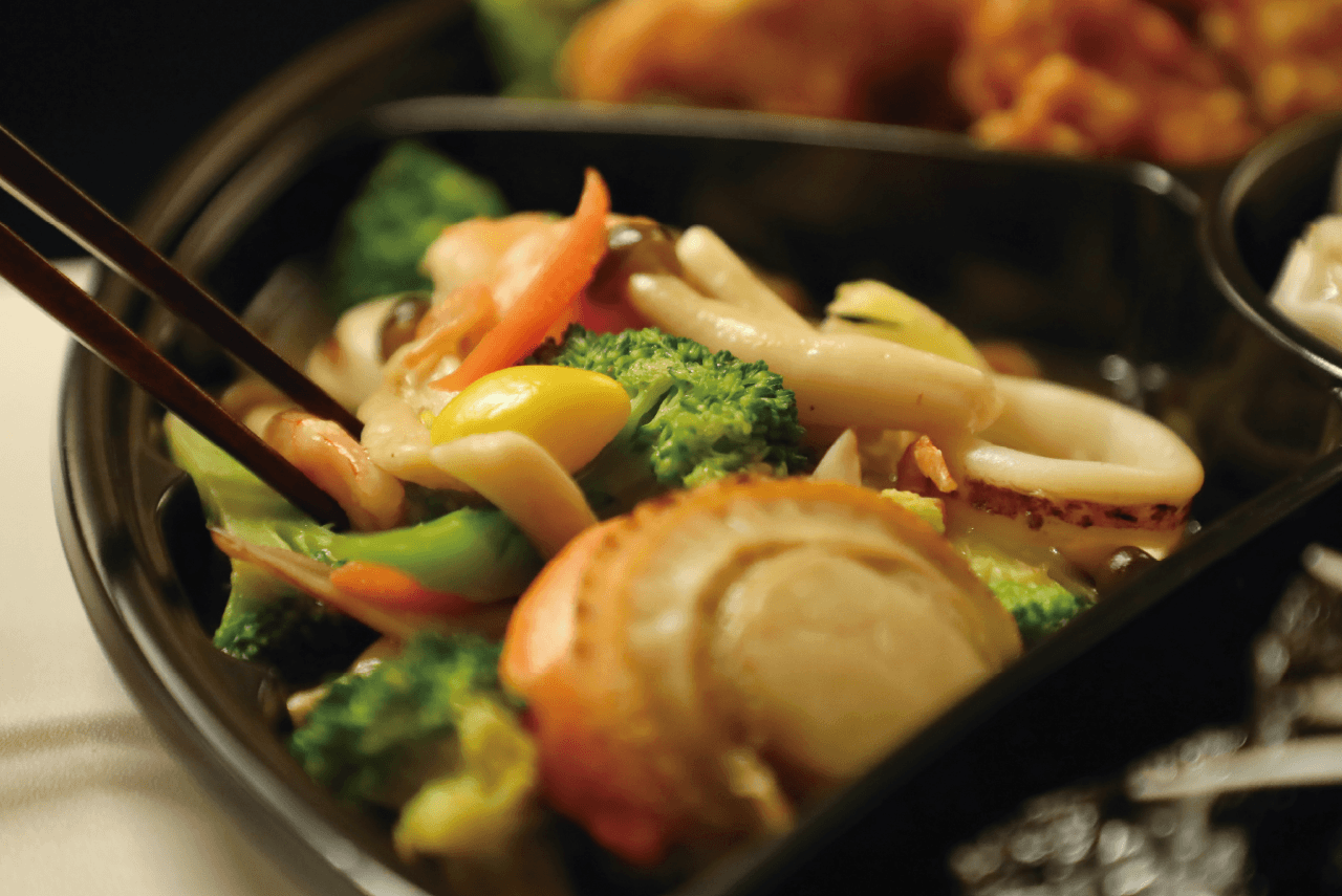 レストラン 真風　海鮮と野菜の彩りXO醤炒め。